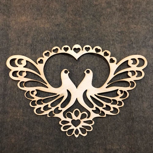 Woodean heart with peacocks