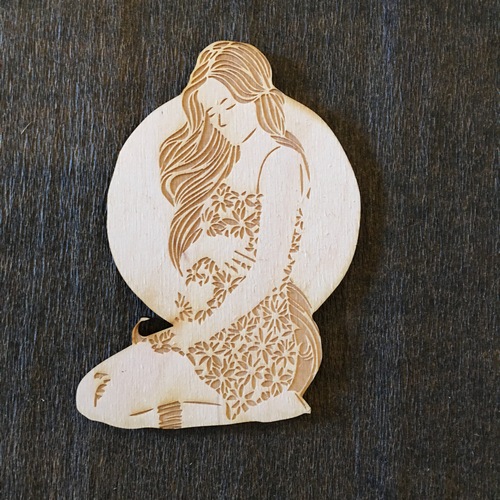 Wooden pregnant woman 