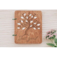 Wooden wish book with tree