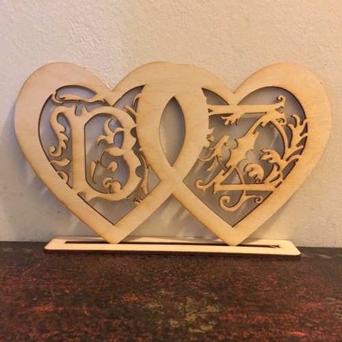 Wooden wedding decoration with couple's initial letters of names