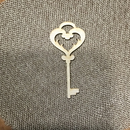 Wooden key for keyring or magnet Wooden key for keyring or magnet