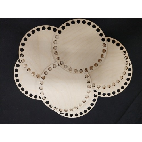 Wooden circle with perimetrical holes Wooden circle with perimetrical holes